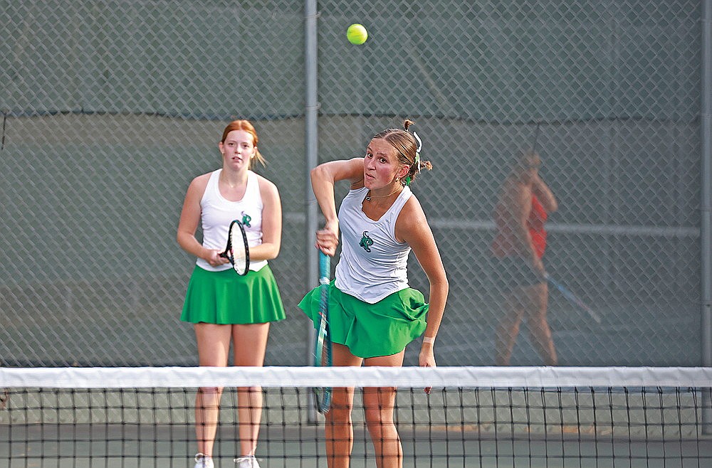 Rhinelander’s Teagan Turcotte plays a point at the net while teammate Maddie Legrey looks on during a non-conference girls’ tennis dual against Wisconsin Rapids at the RHS tennis courts Tuesday, Sept. 30. Turcotte and Legrey rallied at No. 1 doubles for a 2-6, 6-3, 10-5 victory, the clinching point in the Hodags’ 4-3 win. (Bob Mainhardt for the River News)
