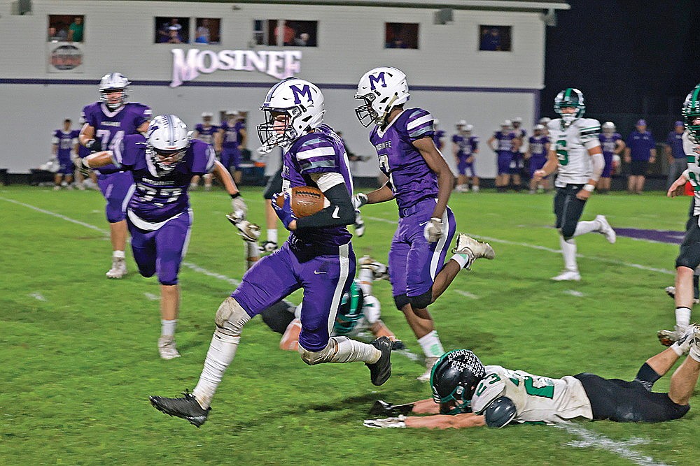 Mosinee’s Alex Steppke hurdles over Rhinelander’s Ben Olson during the first quarter of a GNC football game in Mosinee Friday, Oct. 3. Mosinee defeated Rhinelander, 41-14 in the contest. (Bob Mainhardt for the River News)