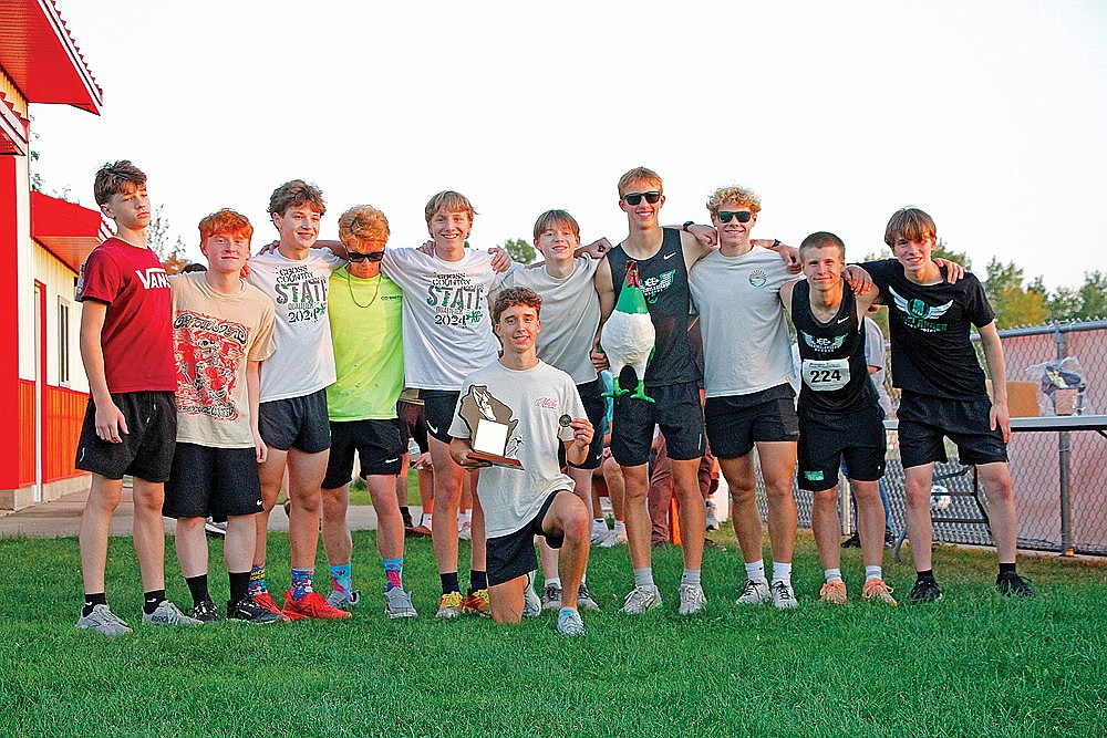The Rhinelander High School boys’ cross country team poses with the trophy after winning the Medford Invite Thursday, Oct. 2 in Medford. Pictured, from left to right, are Chasin Wallmow, Logan Creapeau, Wyatt Crowell, Jonathan Campbell, Grant Gremban, Avrom Barr, Espen McMahon, Jackson Weinzatl, Ayden Myers, Michael Brunette and Matthew Wood. (Jeremy Mayo/River News)