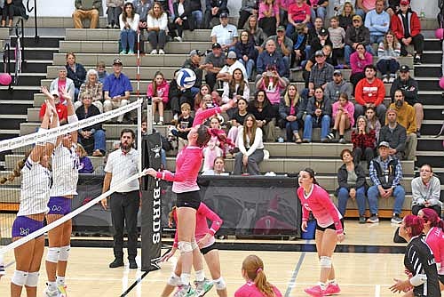 Ava Evenhouse looks for a kill with Mosinee’s Abbi Kluz, left, and Bridget Frye on defense in the third set of a conference match Tuesday, Oct. 7 at the Lakeland Union High School fieldhouse in Minocqua. (Photo by Brett LaBore/Lakeland Times)