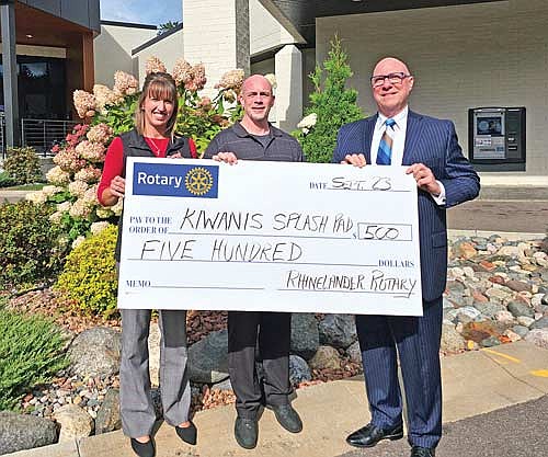 Those present for the check presentation, from left, are: Stephanie Dahlquist, Kiwanis member; Tony Mustacci, Kiwanis member; and David Holperin, Rotary president. (Contributed photograph)