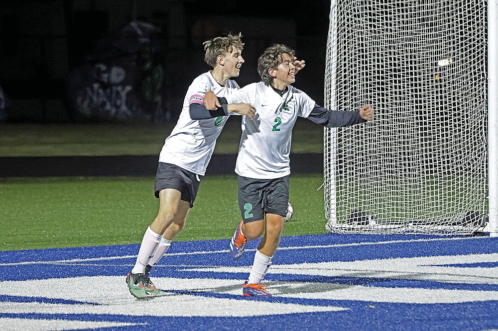 Rhinelander’s Henry Bonardelli (2) celebrates with teammate Kamden Kostrova after scoring a goal during the first half of a GNC boys’ soccer game at Merrill Thursday, Oct. 9. The Hodags tied Merrill 1-1 and won a penalty kick shootout, 4-3, for an extra conference point. (Jeremy Mayo/River News)