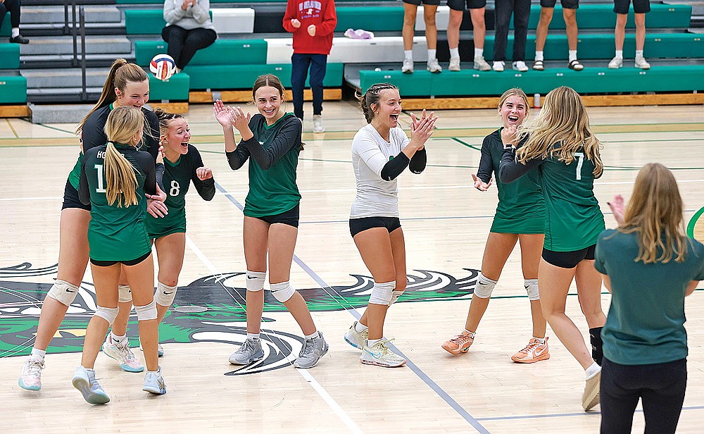 Members for the Rhinelander High School volleyball team, from left to right, Kenzie Paulson, Corynn Waksmonski, Kylie Treder, Vayda Ives, Kayla Skubal, Maddie Paulson and Ava Rathbun, react after Rhinelander defeated Hurley in five sets in a non-conference volleyball match at the Jim Miazga Community Gymnasium Monday, Oct. 13. (Bob Mainhardt for the River News)
