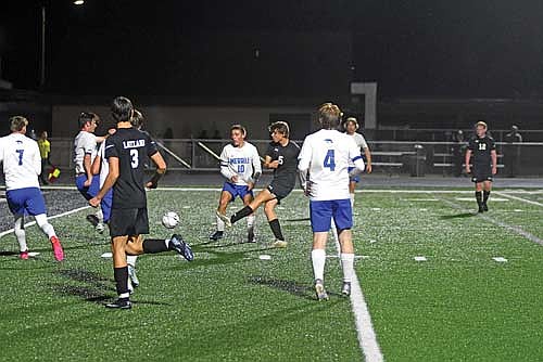 Michael Melka takes a shot on goal in the second half of a conference game against Merrill Tuesday, Oct. 14 at IncredibleBank Field in Minocqua. (Photo by Brett LaBore/Lakeland Times)