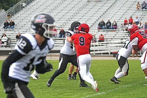 Aidan Bauers blocks Wausau East’s Peyton Nest in the first half of a conference game Saturday, Oct. 11 at Thom Field in Minocqua. (Photo by Brett LaBore/Lakeland Times)