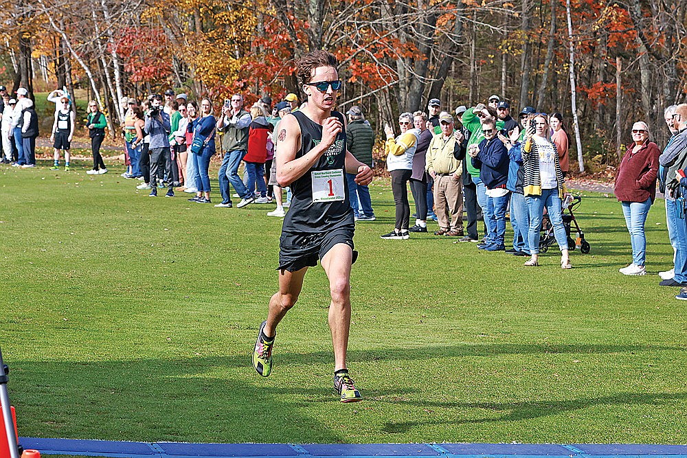 Rhinelander’s Avrom Barr crosses the finish line to win the Great Northern Conference cross country championship meet at Northwood Golf Club in Rhinelander Saturday, Oct. 18. Barr completed the 5-kilometer course in 17 minutes, 1.6 seconds. (Bob Mainhardt for the River News)