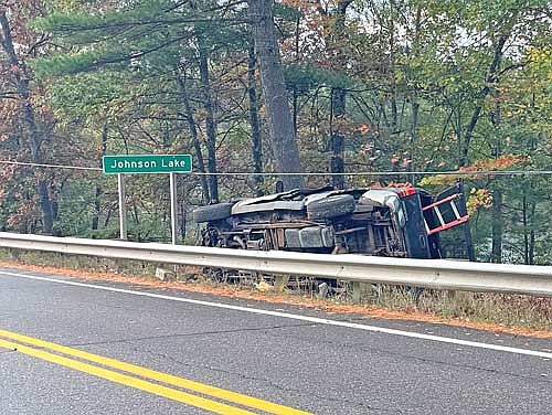 A 2006 GMC Sierra pickup truck rests where it landed following an accident on State Highway 47 in Arbor Vitae on the morning of Oct. 10. (Photo by Brian Jopek/Lakeland Times)