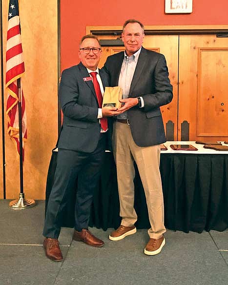 Bob Jaskolski, a 40-plus-year veteran of the grocery industry and current president and CEO of T.A. Solberg, Inc. — parent company of Trig’s stores across northern Wisconsin — has been named the inaugural recipient of the Wisconsin Grocers Association (WGA) Lifetime Achievement Award. Jaskolski, right, is presented the award by WGA CEO and president Mike Semmann. (Contributed photograph)