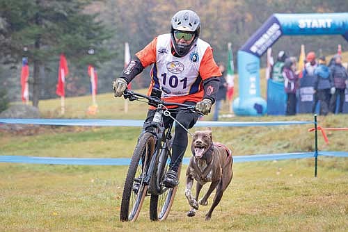 Carolina Hernández Maya from Mexico finishes fifth place in the Dog Canicross race during day one of the 2025 IFSS Dryland Mushing World Championships was held on Tuesday, Oct. 21, at Minocqua Winter Park. (Photo by Kate Reichl/Lakeland Times)