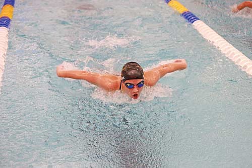 Avalon Collins takes a breath in the 100 butterfly during the Great Northern Conference Meet Friday, Oct. 24 at Rice Lake High School Natatorium. Collins received all-conference honorable mention in the 100 butterfly. (Photo by Bob Mainhardt for the River News)