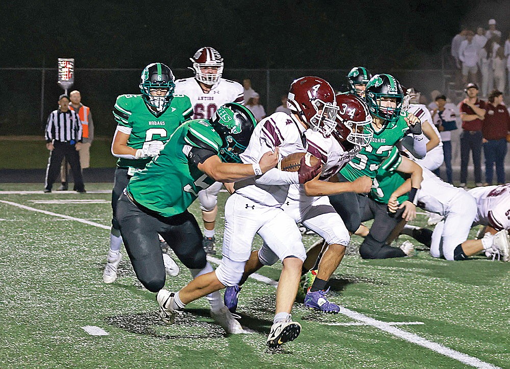 In this Sept. 26, 2025 file photo, Rhinelander’s Caden Sieker wraps up Antigo’s Owen Medo for a loss during the third quarter of the 91st Bell Game against Antigo at Mike Webster Stadium. Sieker, who finished in the top five in both sacks and tackles for loss this season in the Great Northern Conference, was the Hodags’ lone first team All-GNC selection in football. (Bob Mainhardt for the River News)