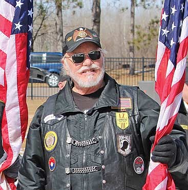 Vietnam veteran Jim Sprague prior to posting the colors for the observance of Vietnam Veterans Day at the Northwoods National Cemetery in Harshaw on March 29, 2024. (Photo by Brian Jopek/Lakeland Times)