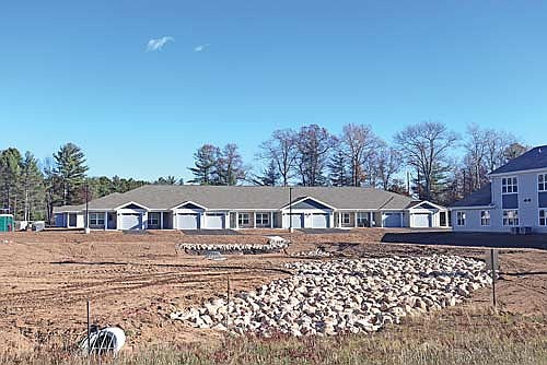The new Woods Hollow Cottages and Townhomes in Woodruff are about 20 percent occupied and 58 percent leased. The 50-unit development was aided by a federal tax credit that, in turn, is expected to keep rent affordable in relation to area income. (Photo by Michael Strasburg/Lakeland Times)