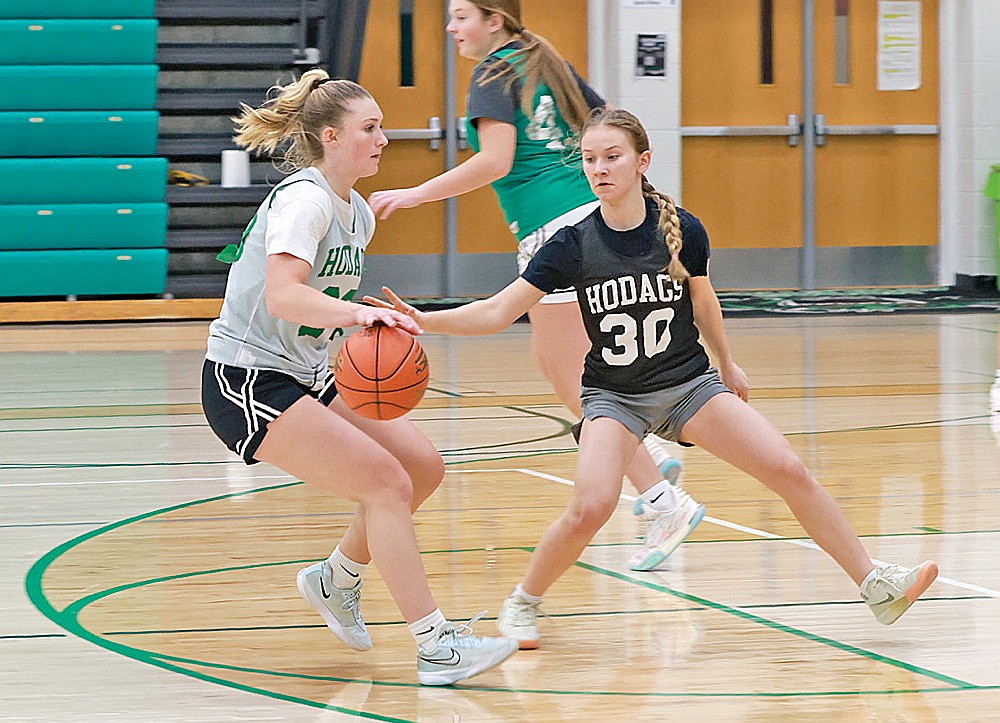 Aubryn Clark, left, drives against Ellie Cummings during Rhinelander High School girls’ basketball practice at the Jim Miazga Community Gymnasium Monday, Nov. 10. (Bob Mainhardt for the River News)