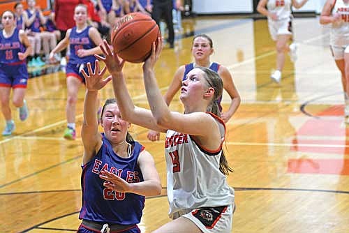 In this Nov. 21, 2024 file photo, Kaylee Powers goes for a layup in a non-conference game against Northland Pines at Coach Leverson Court in Mercer. Powers is one of the top-returning players for the Tigers. (Photo by Brett LaBore/Lakeland Times)