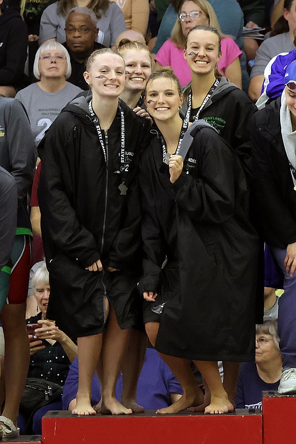 Rhinelander’s 200-yard medley relay stands on the podium following a runner-up finish at the WIAA Division 2 state girls’ swim meet in Waukesha Friday, Nov. 14. Pictured, from left to right, are Kiley Pooch, Millie Gruett, Ella Heck and June Chiamulera. (Jeremy Mayo/River News)