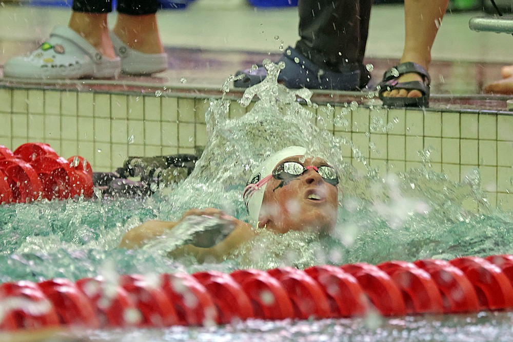 Rhinelander’s Vivian Lamers reaches for the wall at the finish of the 200-yard freestyle relay during the WIAA Division 2 state girls’ swim meet in Waukesha Friday, Nov. 14. (Jeremy Mayo/River News)
