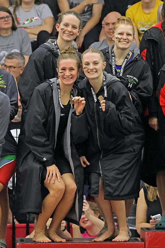 Rhinelander’s 200-yard medley relay stands on the podium following a fourth-place finish at the WIAA Division 2 state girls’ swim meet in Waukesha Friday, Nov. 14. Pictured, from top left to bottom right, are Rylee Mickevicius, Millie Gruett, Vivian Lamers and Kiley Pooch. (Jeremy Mayo/River News)