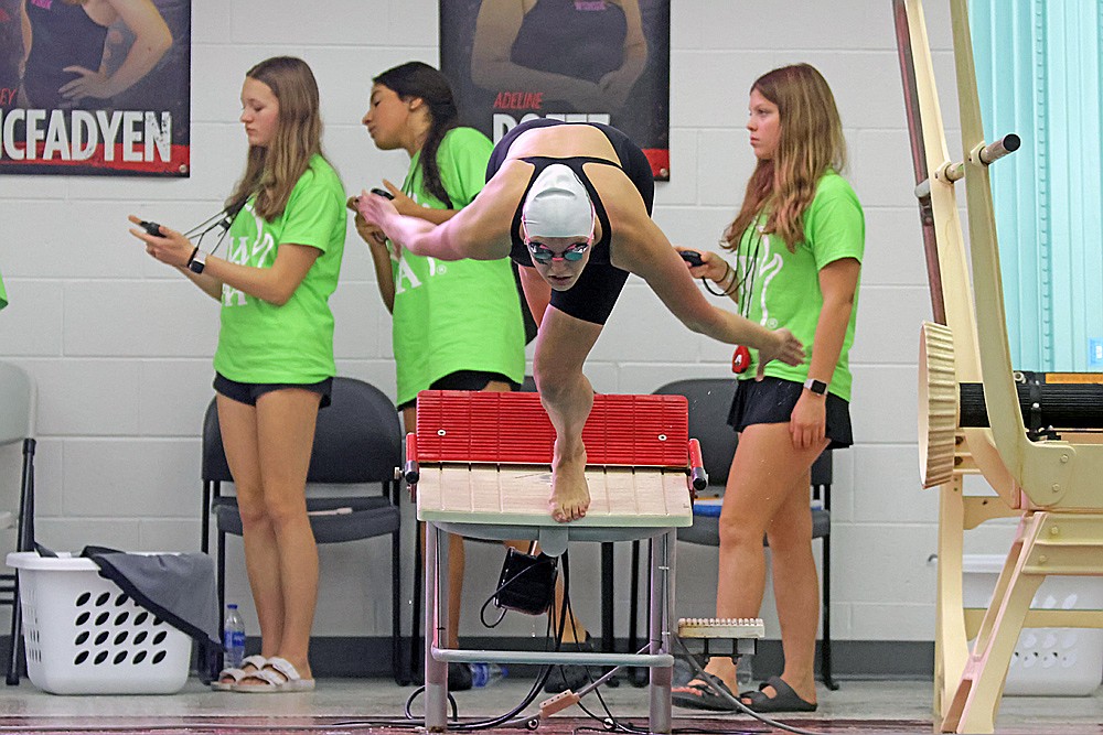 Rhinelander’s Ella Heck takes off to begin the 100-yard breaststroke during the WIAA Division 2 state girls’ swim meet in Waukesha Friday, Nov. 14. (Jeremy Mayo/River News)