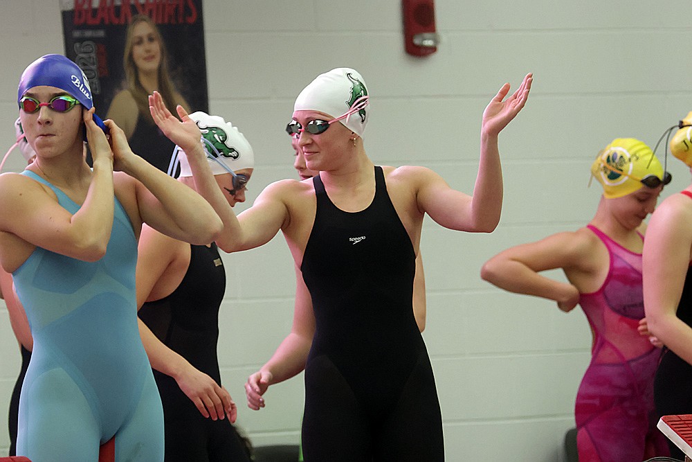 Rhinelander’s Vivian Lamers gets excited prior to the start of the 400-yard freestyle relay during the WIAA Division 2 state girls’ swim meet in Waukesha Friday, Nov. 14. (Jeremy Mayo/River News)