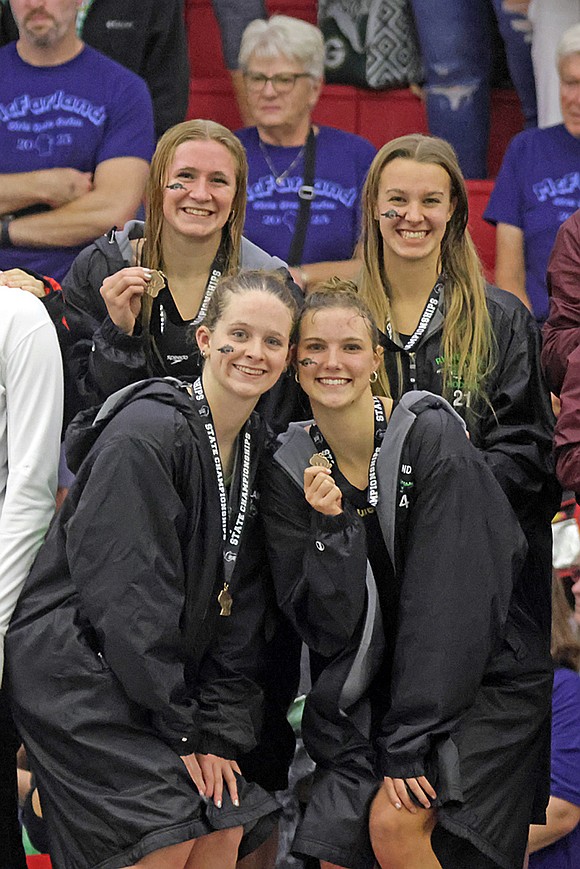Rhinelander’s 400-yard medley relay stands on the podium following a third-place finish at the WIAA Division 2 state girls’ swim meet in Waukesha Friday, Nov. 14. Pictured, from top left to bottom right, are Vivian Lamers, June Chiamulera, Rylee Mickevicius and Ella Heck. (Jeremy Mayo/River News)