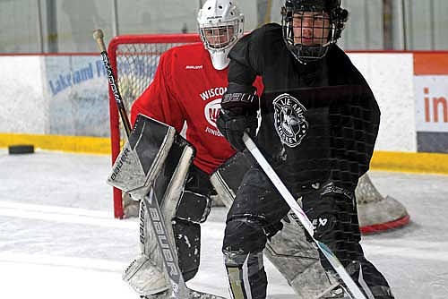 Landon Van Berkel, front, and goalie Cam Bernard are two players who have plenty of ice experience over the years. (Photo by Brett LaBore/Lakeland Times)