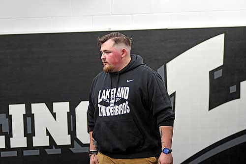 Jacob Merrill leads the first day of girls’ wrestling practice Monday, Nov. 17 inside the Lakeland Union High School wrestling room in Minocqua. (Photo by Brett LaBore/Lakeland Times)