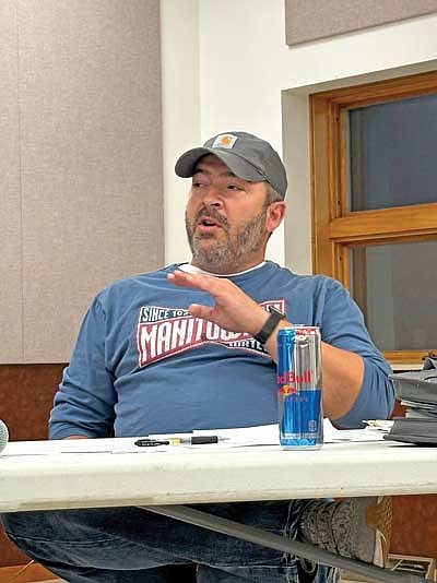 Manitowish Waters town supervisor Doug Zeise clarifies the tax increase during the annual town meeting of electors at the town hall Tuesday, Nov. 18. (Photo by Trevor Greene/Lakeland Times)