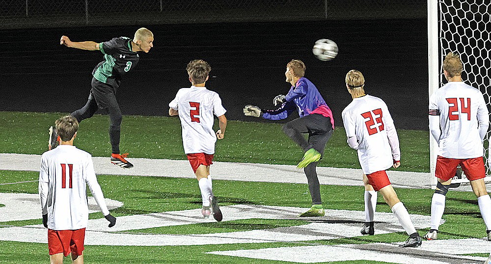 In this Oct. 7, 2025 file photo, Rhinelander’s Asher Rivord heads a shot past Medford goalkeeper Eric Paul in the first half of a GNC boys’ soccer game at Mike Webster Stadium Tuesday, Oct. 7. Rivord was the Hodags’ leading scorer in 2025 and his goal against the Raiders proved to be the only goal scored in the Hodags’ lone win of the season. (Jeremy Mayo/River News)