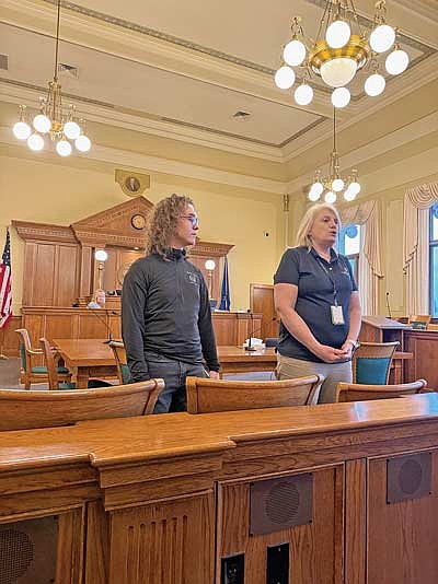 Rhinelander High School student Rory Young and Sharon Krouse of UW‑Extension participate in Teen Court proceedings at the Oneida County Courthouse in Rhinelander. The program offers youth charged with their first misdemeanor offense the chance to appear before a jury of peers.
(Contributed photograph)