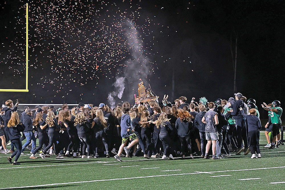 In this Sept. 26, 2025 file photo, the Rhinelander High School football team celebrates with the student body after winning the 91st Bell Game over Antigo 54-8 at Mike Webster Stadium. Winning the Bell back for the first time since 2021 was one of the top highlights this season as the Hodags went 3-7 and qualified for the WIAA playoffs for the fifth time in seven years. (Bob Mainhardt for the River News)