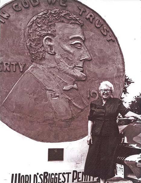 Dr. Kate Pelham Newcomb stands in front of the World’s Largest Penny. (Contributed photograph)