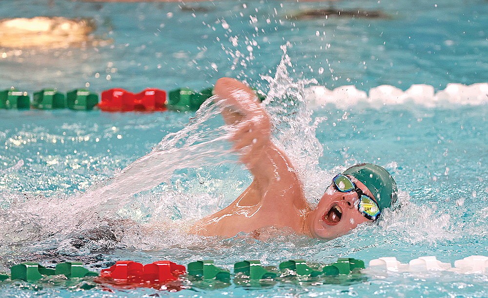 McCray Wagner competes in the boys’ 11 and over 100-yard freestyle.