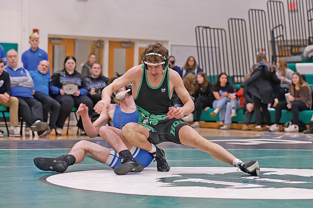 Rhinelander’s Avrom Barr looks to gain control over Merrill’s Noah Clifford in a 144-pound match during a GNC boys’ wrestling dual meet at the Jim Miazga Community Gymnasium Thursday, Dec. 11. Barr pinned Clifford, scoring Rhinelander’s lone contested victory in a 69-12 loss to the Bluejays. (Bob Mainhardt for the River News)