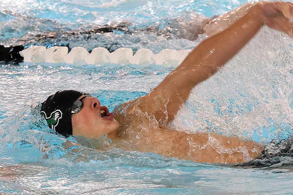 Rhinelander’s Dean Gillingham competes in the 100-yard backstroke during a GNC boys’ swimming dual meet at Medford Thursday, Dec. 11. Gillingham won three events for Rhinelander, while swimming in four consecutive races, as the Hodags defeated the Raiders, 136-19. (Matt Frey/Star News)