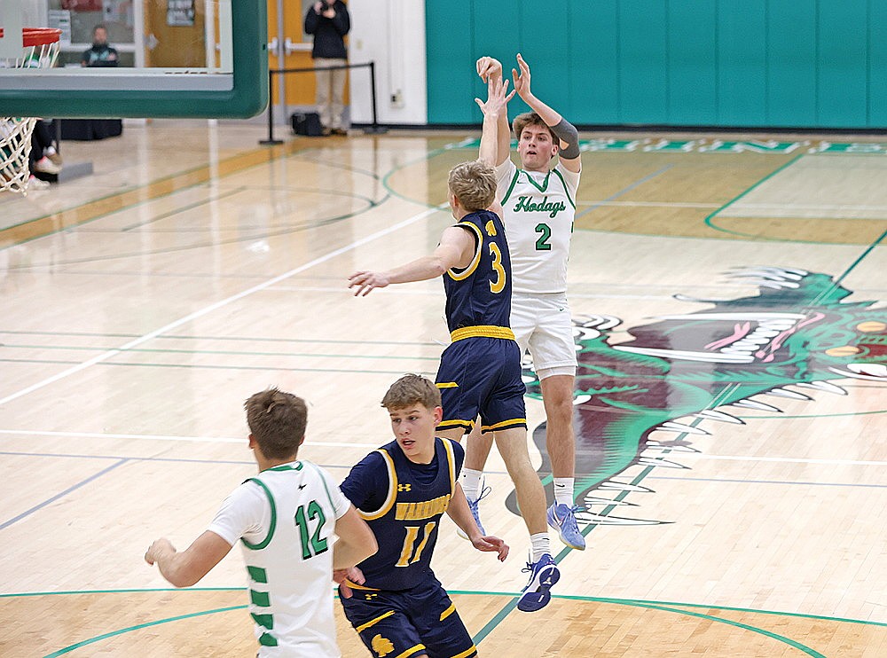 Rhinelander’s Devon Feck attempts a 3 over Wausau West’s Miles Waldvogel during the first half of a non-conference boys’ basketball game at the Jim Miazga Community Gymnasium Tuesday, Dec. 16. Feck was 7 of 8 from 3-point range and scored a career-high 25 points in the Hodags’ 61-38 win. (Bob Mainhardt for the River News)