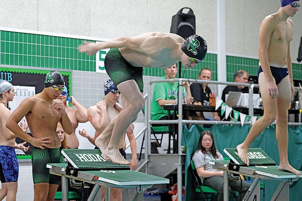 Rhinelander’s Judson O’Malley leaves the starting blocks during the 150-yard mixer medley relay at the Hodag Relays boys’ swim meet at the Heck Family Community Pool Saturday, Dec. 13. O’Malley, Dean Gillingham and Charlie Antonuk teamed up to set three meet records for the Hodags, who took second in the six-team meet. (Jeremy Mayo/River News)