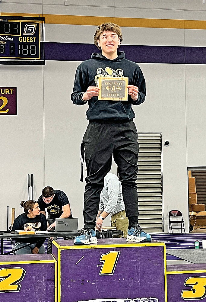 Rhinelander’s Myles Eagleson stands on the top of the podium after being named male lifter of the meet in a WHSPA powerlifting meet in Ashland Saturday, Dec. 13. (Contributed photograph)