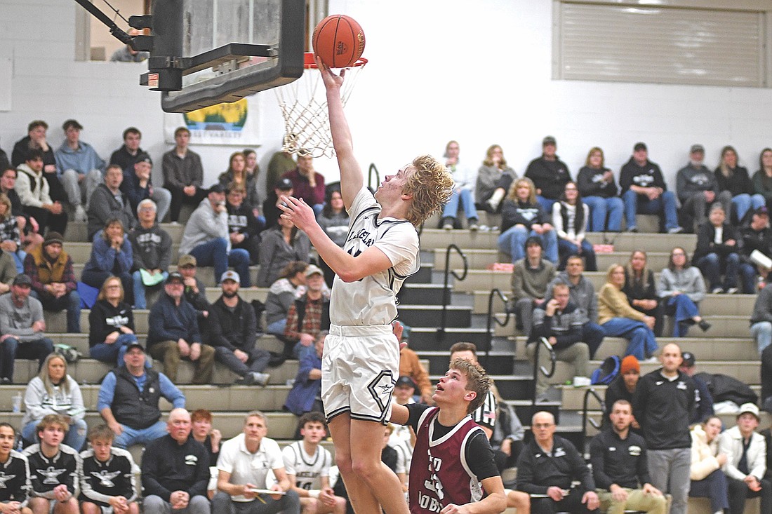 Gabe Karch scores a basket in the second half of a 76-36 win over Antigo Friday, Dec. 19 at Ted Voigt Court in Minocqua. Karch scored a varsity career-high 24 points. (Photo by Brett LaBore/Lakeland Times)