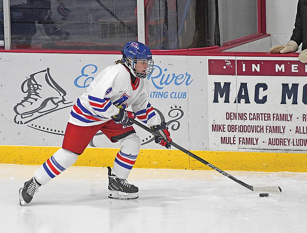 Lena Chiamulera skates with the puck in the second period of a game against Wisconsin Valley Union Monday, Dec. 22 at the Eagle River Recreation Association Sports Arena. (Brett LaBore/Lakeland Times)