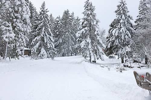 Snow covers roads in Pine Lake Monday, Dec. 29. Rhinelander officially received 10.9 inches of snow from a storm Dec. 28-29, according to the National Weather Service, with locations further north receiving additional accumulation. (Photo by Bob Mainhardt for the River News)