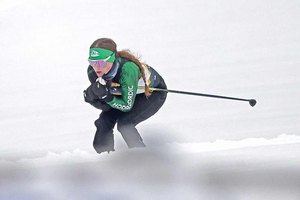 Hodag Nordic’s Noelle Mayo tucks on a downhill near the finish of the Lakeland Invite Nordic Ski race at Minocqua Winter Park Sunday, Jan. 4. The Hodags finished third in the girls’ division of the six-team meet. (Contributed photograph)