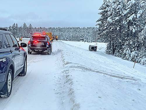 Deputies with the Vilas County Sheriff’s Office and members of Arbor Vitae Fire and Rescue responded to a rollover crash of a 2004 GMC Envoy on New Year’s Day in Arbor Vitae. There were no injures. (Photo by Brian Jopek/Lakeland Times)
