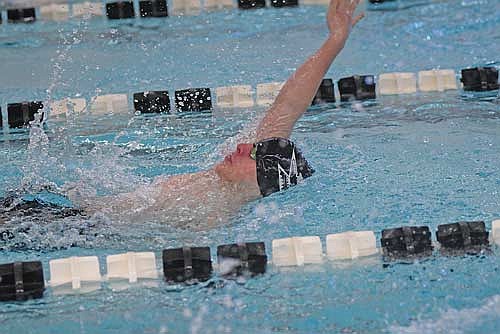 Garrison Jacques swims the 100 backstroke in a conference dual against Rhinelander Thursday, Jan. 8 at the Lakeland Union High School pool in Minocqua. Jacques took second with a personal-best time of 1:11.52. (Photo by Brett LaBore/Lakeland Times)