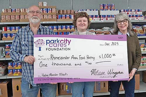 Those present for the Rhinelander Area Food Pantry check presentation, from left, are: David Moore, Tiki Kruger-Boehm and Courtney Smith.
(Contributed photograph)