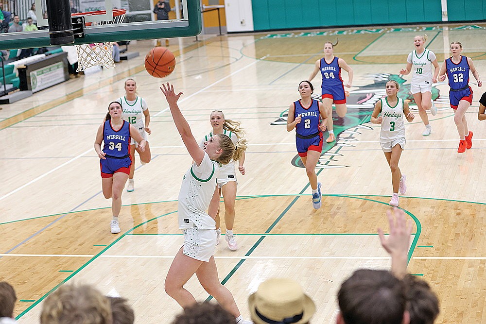 Rhinelander’s Aubryn Clark drives in for a layup during the first half of a GNC girls’ basketball game against Merrill at the Jim Miazga Community Gymnasium Friday, Jan. 9. Clark recorded her 1,000th career point on the play, becoming the sixth player in program history to reach the milestone. (Bob Mainhardt for the River News)
