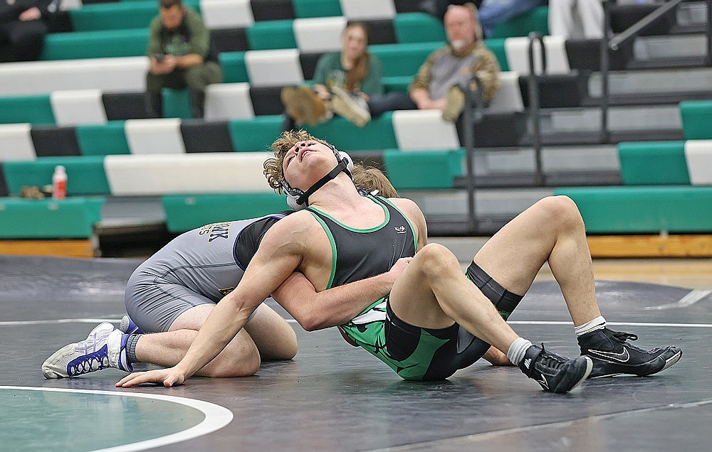 Rhinelander’s Anthony Boldt looks to escape the grasp of Tomahawk’s Mason Towle in a 150-pound match during a GNC boys’ wrestling dual meet at the Jim Miazga Community Gymnasium Thursday, Jan. 8. The Hodags fell to the Hatchets, 63-12. (Bob Mainhardt for the River News)