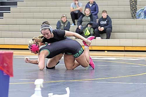Micah Wright grabs ahold of Rhinelander’s Nevaeh Anderson in the 152.9-181.8-pound weight class during a GNC/WVC Challenge Night Monday, Jan. 12 at the Lakeland Union High School fieldhouse in Minocqua. Wright took first place. (Photo by Jeremy Mayo/River News)