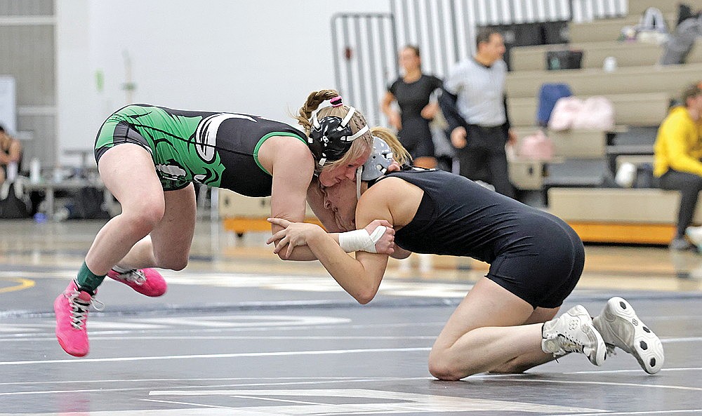 Rhinelander’s Cassidy Lindner, left, grapples Lakeland’s Emma Louis during a GNC/WVC Challenge match in Minocqua Monday, Jan. 12. Lindner won both of her matches Monday following a runner-up finish at 120 pounds in the Merrill Bluejay Challenge Saturday, Jan. 10. (Jeremy Mayo/River News)