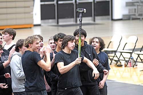 Kade Elm lifts the Handrick Hammer following Lakeland’s 58-23 victory over Rhinelander Thursday, Jan. 15 at the Lakeland Union High School fieldhouse in Minocqua. Elm earned a pin at 165 pounds. (Photo by Brett LaBore/Lakeland Times)
